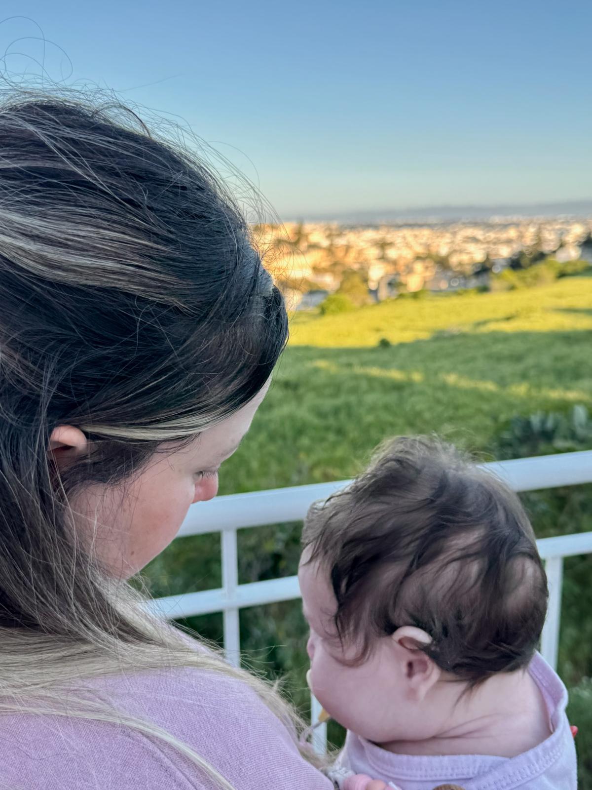 Mijal with her daughter